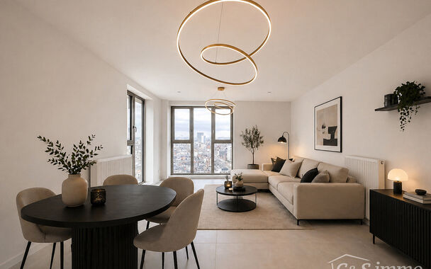 Luxe nieuwbouw appartement op de 20e verdieping met 270 graden uitzicht over Antwerpen, Park Spoor Noord, het Eilandje en de dokken. De lichtrijke leefruimte (ca. 26 m&sup2;) met open  keuken (ca. 6 m&sup2;) is voorzien van een keramische kookplaat, dampkap, koel