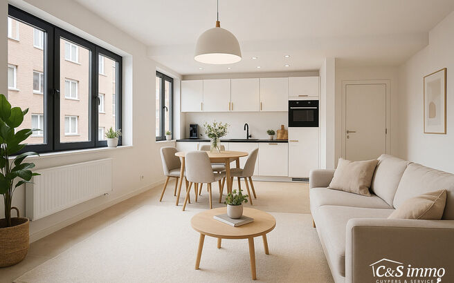 Stap binnen in dit smaakvol afgewerkte appartement, gelegen in een klasse vol gerenoveerd gebouw op wandelafstand van het centrum van Edegem.
De inkomhal biedt directe toegang tot de moderne open keuken, volledig uitgerust met hoogwaardige Siemens-toestel