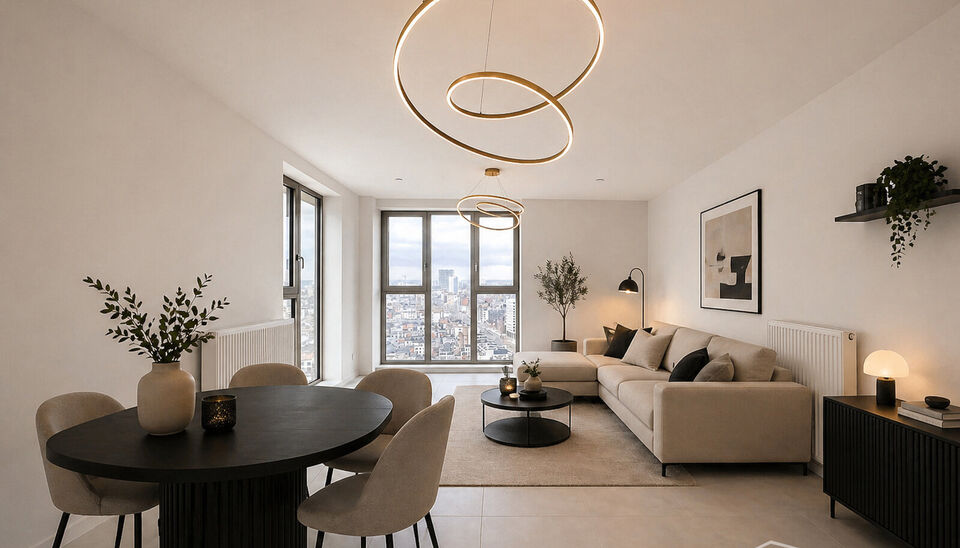 Luxe nieuwbouw appartement op de 20e verdieping met 270 graden uitzicht over Antwerpen, Park Spoor Noord, het Eilandje en de dokken. De lichtrijke leefruimte (ca. 26 m&sup2;) met open  keuken (ca. 6 m&sup2;) is voorzien van een keramische kookplaat, dampkap, koel