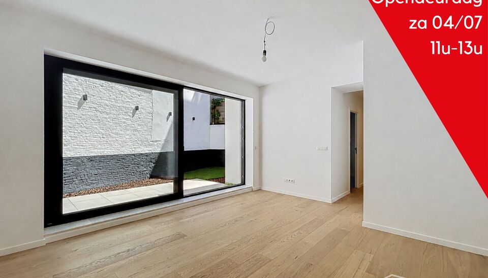 Wonen in &eacute;&eacute;n van de mooiste straten van Antwerpen? Welkom in residentie Emilia op de Dodoensstraat 6.&nbsp;
Een recent gerenoveerd gelijkvloers appartement met ruime zonnige tuin.&nbsp;
Via de inkomdeur komt u uit in de ruime keuken voorzien van alle nodige toe
