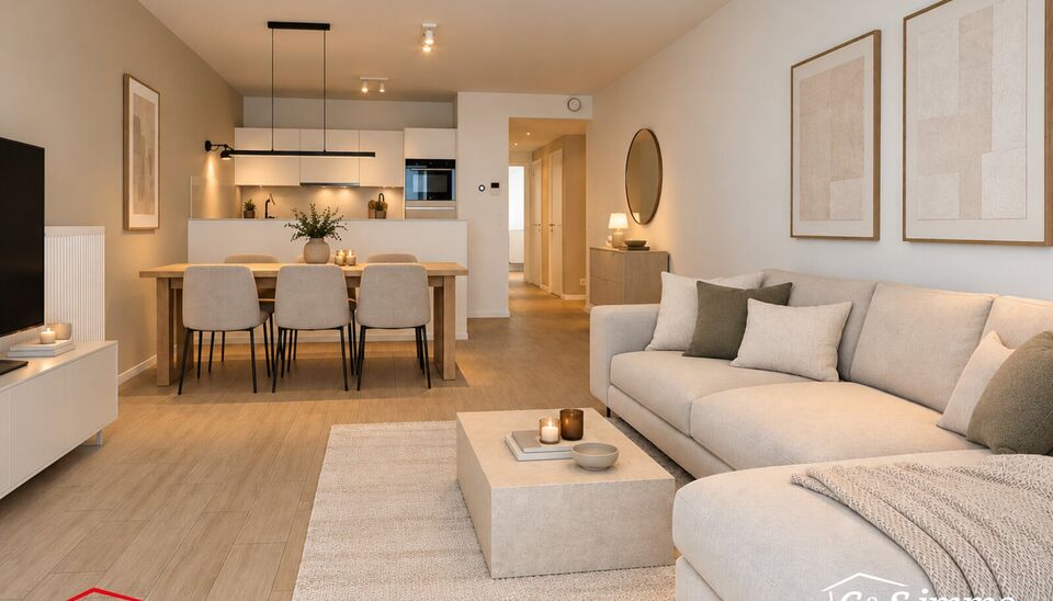 Dit energiezuinig appartement bevindt zich in een recent gebouw (2018) nabij het Rivierenhof. U betreedt het appartement via de inkomhal (ca.7 m&sup2;) met voldoende kastruimte en apart toilet. Lichtrijke woonkamer op keramische parket met een open keuken. De
